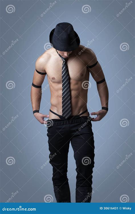 Handsome Muscular Guy Taking Off Clothes Stock Image - Image of ...