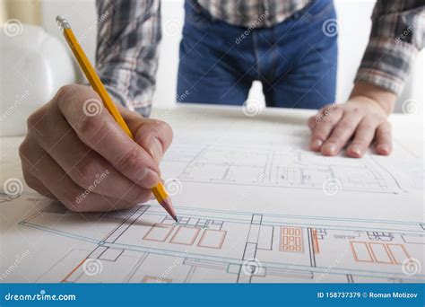 Architects Working on Blueprint, Real Estate Project. Architect ...