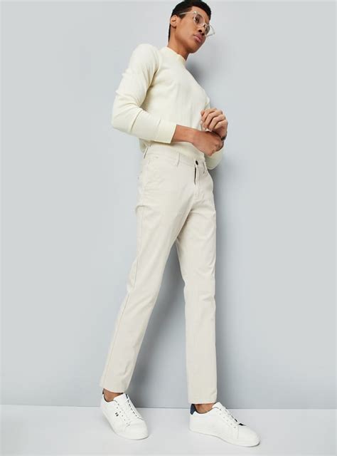 Buy Men Solid Flexi Waist Slim Fit Chinos Online at just Rs. 1499.0 ...
