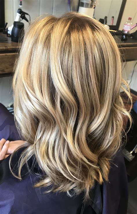 Bright blonde highlights on dark blonde hair color | Dark blonde hair ...