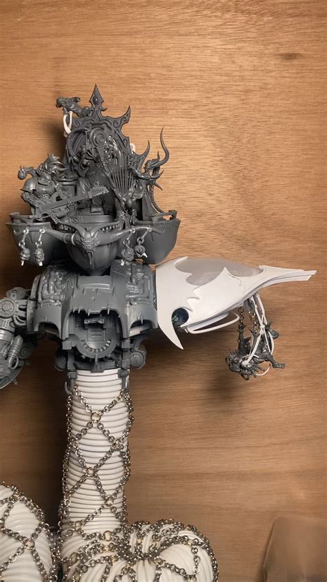 Slaanesh knight kitbash. A close up of the bodies on the shoulder and ...