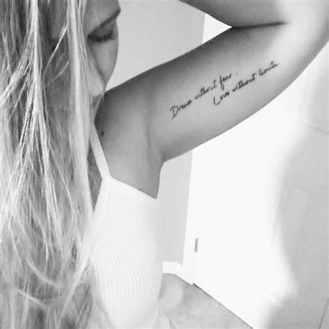 Female inner bicep tattoo. "Dream without fear, love without limits." | Inner bicep tattoo ...