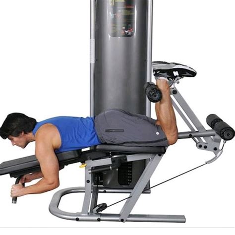 Image result for Hamstring Curl with Weight Machine