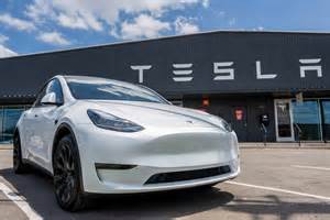 Tesla Stock Like an “AI ETF, ” Says Wall Street Pro - 24/7 Wall St.