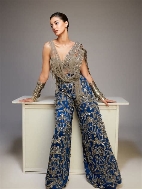 Ananya Panday wore silver jewellery as a bralette over her blue hand ...