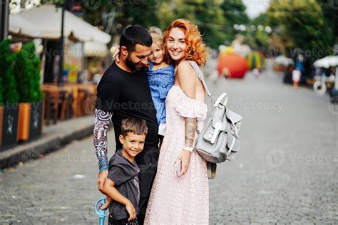 beautiful parents and their cute little kids 11532519 Stock Photo at Vecteezy