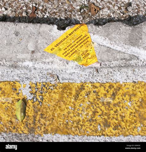 Spanish language sign saying that vehicle has been removed by municipal ...