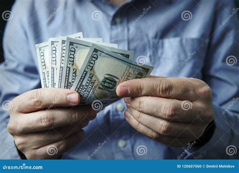 Cash in Hands. Profits, Savings. Stack of Dollars Stock Photo - Image ...