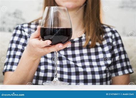 A Woman with Glass Red Wine. a Woman is Drinking Red Wine Stock Image ...