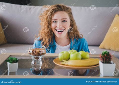 Photo of Nice Ginger Young Girl Excited Eat Healthy Snacks Wear Blue ...
