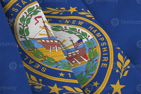 New Hampshire US state flag with big folds waving close up under the ...