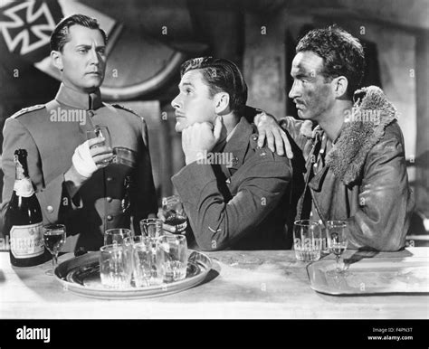 Carl Esmond, Errol Flynn and David Niven/ La Patrouille de l'aube ...