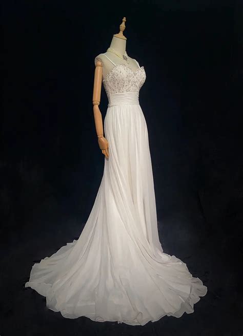 Lace Bodice Bridal Gown With Flowing Train on Luulla