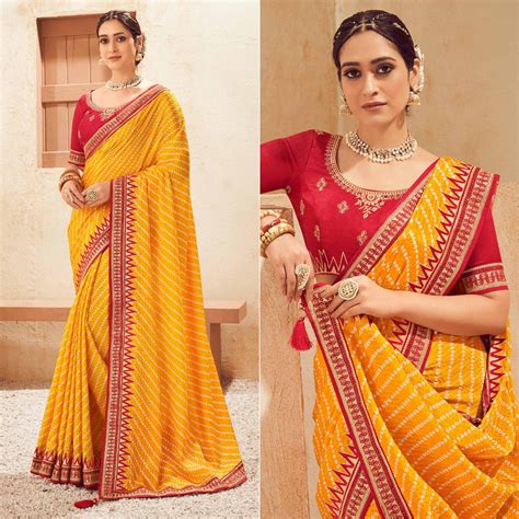Yellow Printed With Embellished Chiffon Saree With Tassels