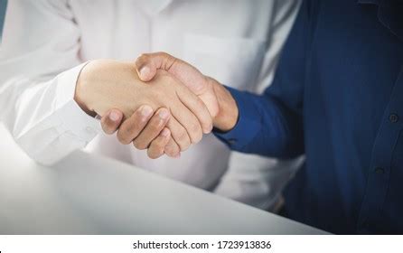 Image result for Two Figures Shaking Hands