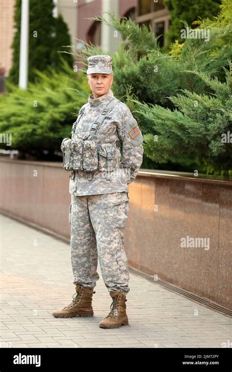 Mature female soldier in military uniform outdoors Stock Photo - Alamy