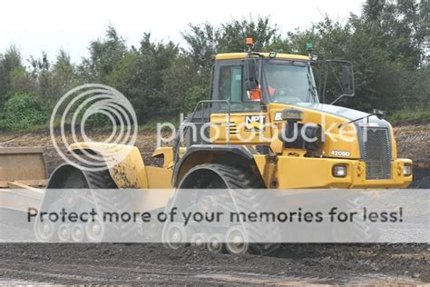 Image result for Bell Scraper Tractor