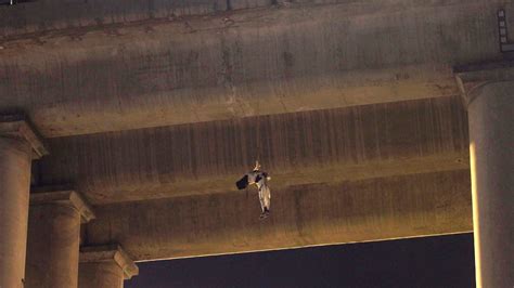 Corpse of a man wrapped in bandages found hanging from major Mexico ...