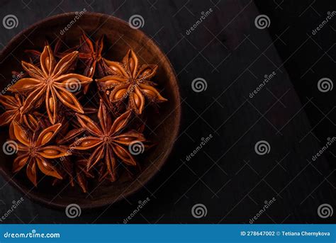 Star Shaped Spice Star Anise in a Wooden Round Bowl Stock Photo - Image ...