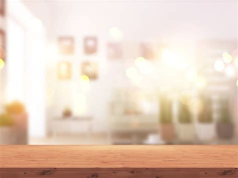 3d wooden table against a defocussed sunny room interior | Free Photo