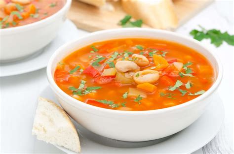 Download Enjoying a comforting bowl of homemade soup | Wallpapers.com
