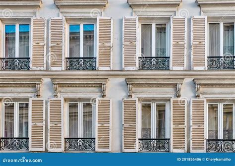 Street View of Traditional French Windows with Shutters and Wrought ...