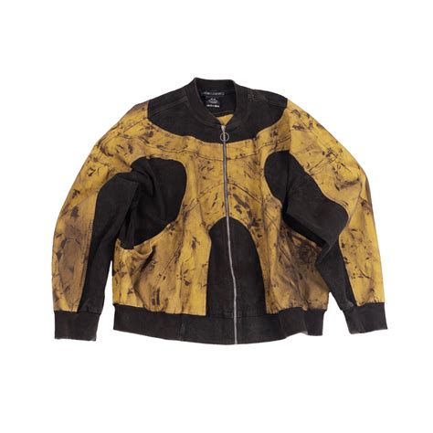 Oversized unisex panelled denim jacket with hand-painted mud washed su ...