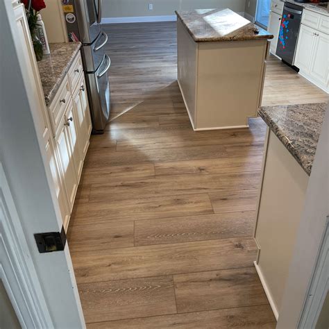 American Flooring Luxury Vinyl Plank - Saddleback Carpet and Flooring