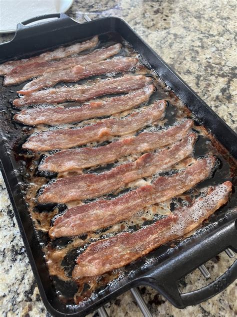 Sunday morning bacon on the lodge cast iron baking sheet : r/CastIronBaking