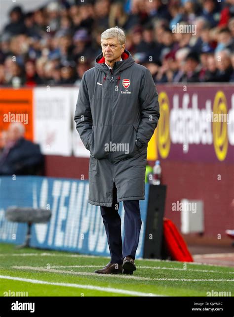 Arsenal manager Arsene Wenger looks on from the touchline during the ...