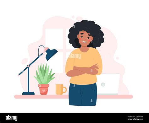 Black woman entrepreneur standing in front of desk with crossed arms ...