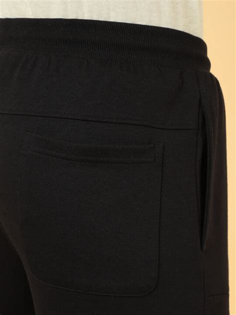 Men Black Interlock Mid Rise Regular Fit Joggers