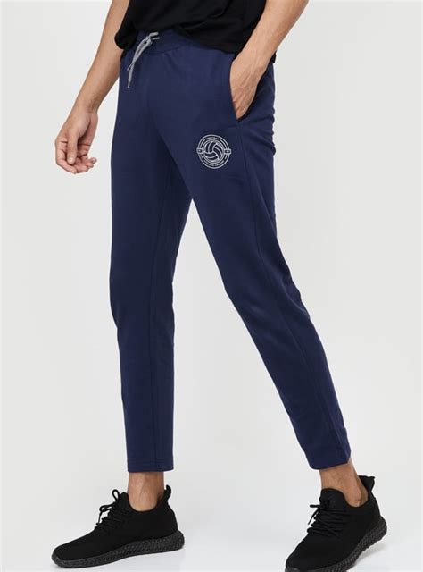 Buy Men Textured Slim Fit Track Pants Online at just Rs. 599.0 ...