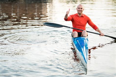 Free Photo | Front view man in canoe showing approval