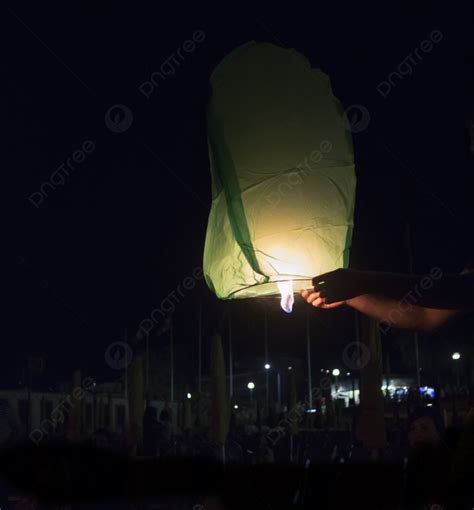 Hot Air Lantern Taking Off In Dark Sky Photo Background And Picture For ...