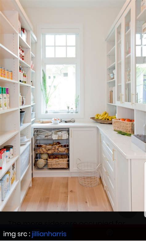Pantry with window, upper shelves, countertops, and base cabinets ...