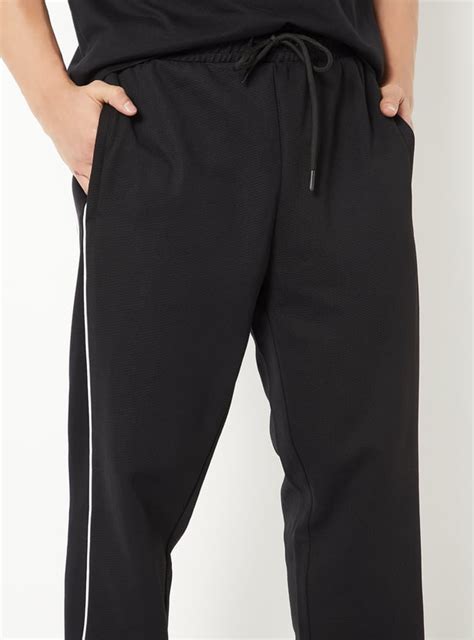 Buy Men Side Stripes Sports Track Pants Online at just Rs. 1299.0 ...