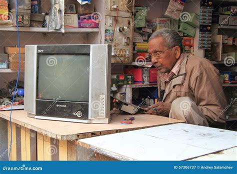 Man is Repairing Tv in Repair Shop Editorial Photography - Image of ...