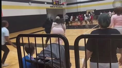 Caught on video | Parents rush court as players fight during Houston ...