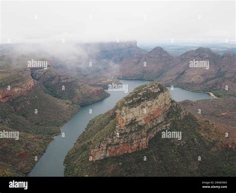Blyde River Canyon with low hanging clouds, on the panorama route in ...
