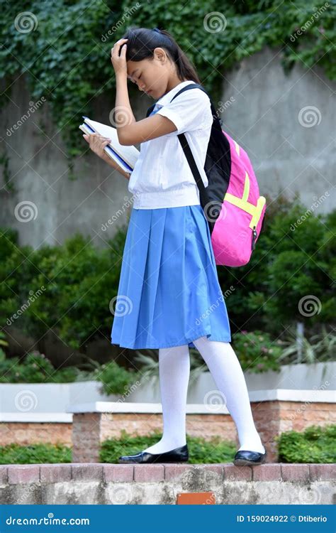 A Sad Young Minority Girl Student Stock Photo - Image of adorable ...