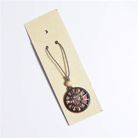 Buy Coconut Shell Pendent/Sri Mother Symbol | Auroville.com – Auroville ...
