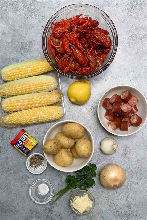 Louisiana Crawfish Boil Recipe with Garlic Butter Sauce - IzzyCooking
