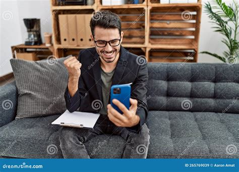 Young Hispanic Psychologist Man Doing Therapy on Video Call with ...