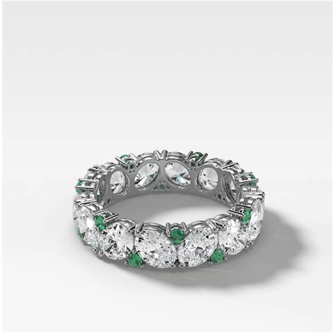 Oval Diamond and Green Emerald Medley Eternity Band | Diamond wedding ...