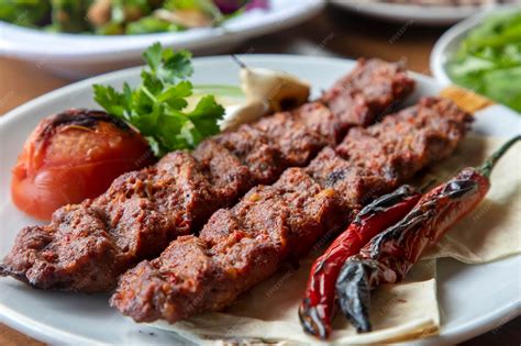 Traditional delicious turkish foods; adana kebab | Premium Photo