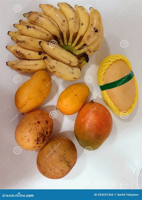 Mangoes of Different Varieties and Bananas Stock Image - Image of ...