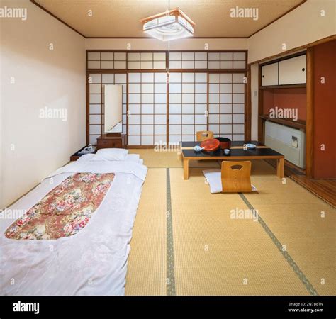 A typical traditional Japanese bedroom that embodies the essence of ...