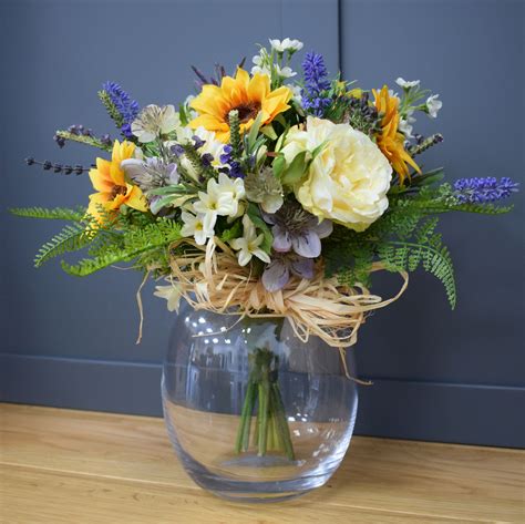 Artificial Flower Arrangement with Roses and Sunflowers in a Clear ...