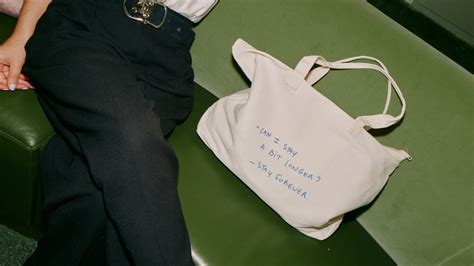 Thomas Lélu holding signature note handwritten on W Hotels paper